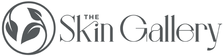 A green banner with the words " the skin group ".